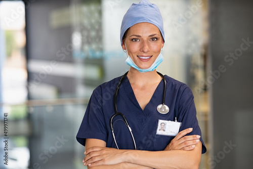 Satisfied female surgeon at hospital photo