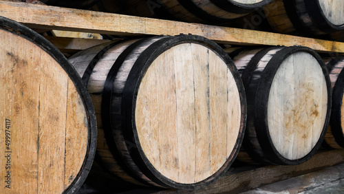 Oak barrels stacked with tequila ready for maturation