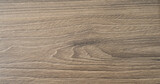 Drewniana podłoga z desek, pięknie wyglądające sęki i przyrosty.