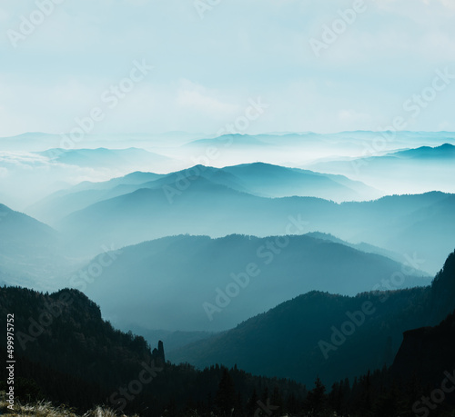 Misty mountains landscape © IBEX.Media