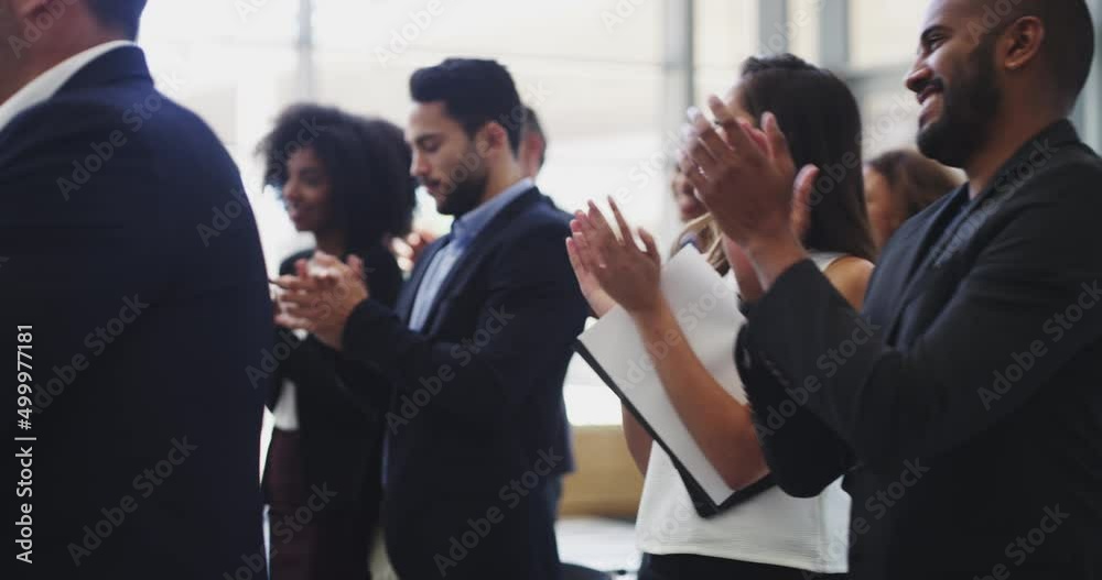 Thats worth a standing ovation. Businesspeople applauding while attending a conference. Diverse team celebrating 