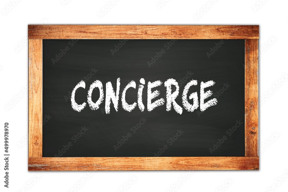 Fototapeta premium CONCIERGE text written on wooden frame school blackboard.