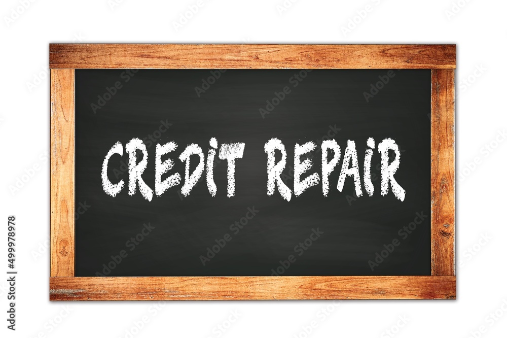 CREDIT REPAIR text written on wooden frame school blackboard. CREDIT REPAIR text written on wooden frame school blackboard.
