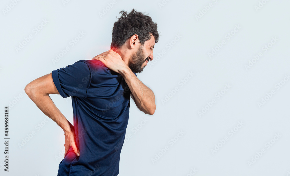 Man with spine and shoulder problems, person with back and shoulder problems on isolated background, lumbar and muscular problems concept Man with spine and shoulder problems, person with back and shoulder problems on isolated background, lumbar and muscular problems concept
