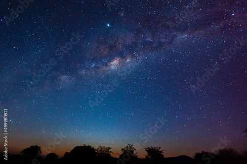Fotografiet Image of the milky way galaxy spanning across the night sky in Namibia