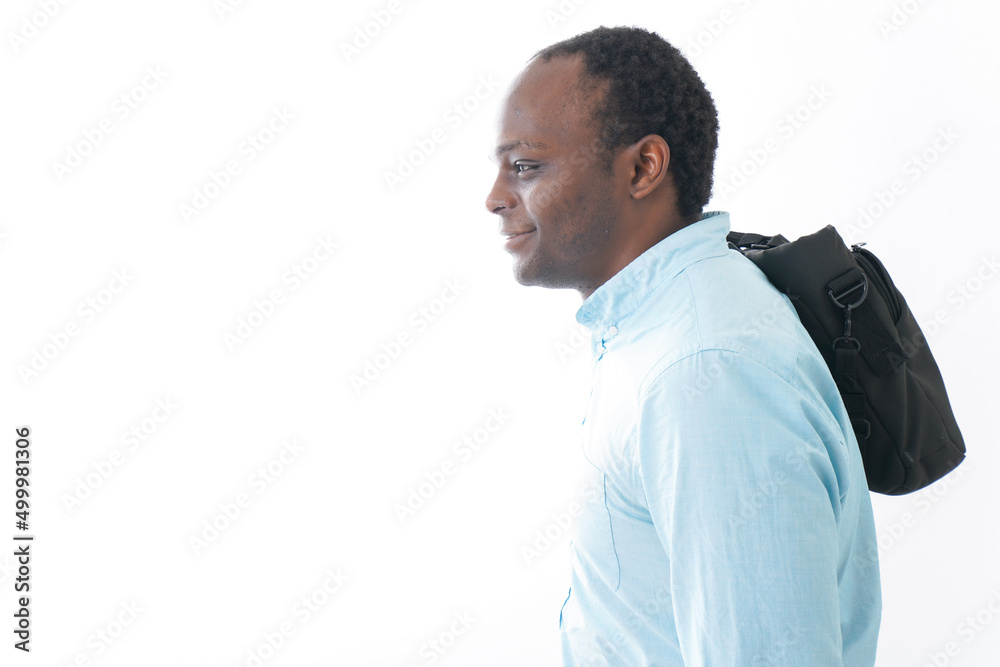 Black man commuting with bag Black man commuting with bag