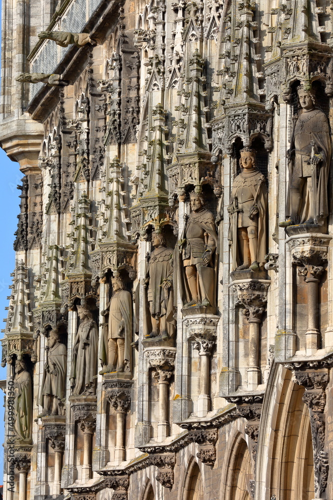 Close-up on statues and ornaments (Dutch Gothic architecture) on the external facade the gothic styled Stadhuis (town hall), located on the Markt (main Square) in Middelburg, Zeeland, Netherlands