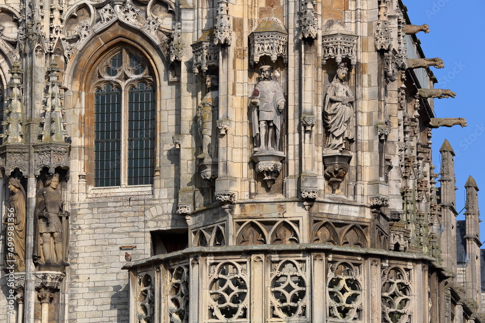Close-up on statues and ornaments (Dutch Gothic architecture) on the external facade the gothic styled Stadhuis (town hall), located on the Markt (main Square) in Middelburg, Zeeland, Netherlands