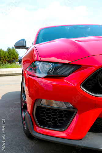 Front view of a red modern car. modern optics.