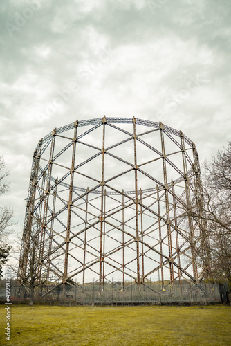 New Barnet  London  UK - April 11  2022  A disused gasworks facility  with it s rusted iron beams.