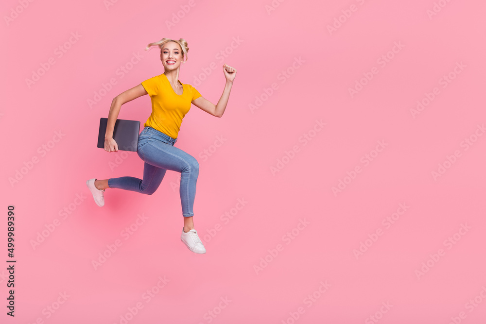 Full size photo of attractive girl in casual denim wear running fast deadline hour isolated on pink color background