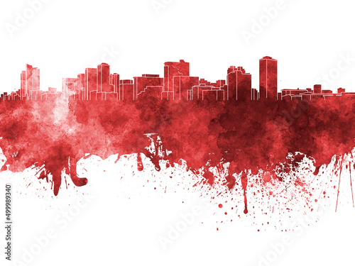 Manila skyline in red watercolor on white background