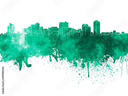 Manila skyline in green watercolor on white background