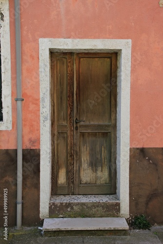 Italy: Old wooden ruined door. © Raffaello Tiziano