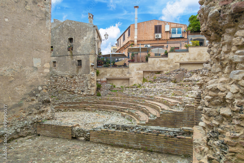 Fototapeta premium Taormina (Sicilia, Italy) - A historical center view of the touristic city in province of Messina, Sicily island, during the summer, famous for Isola Bella beach and the old theatre