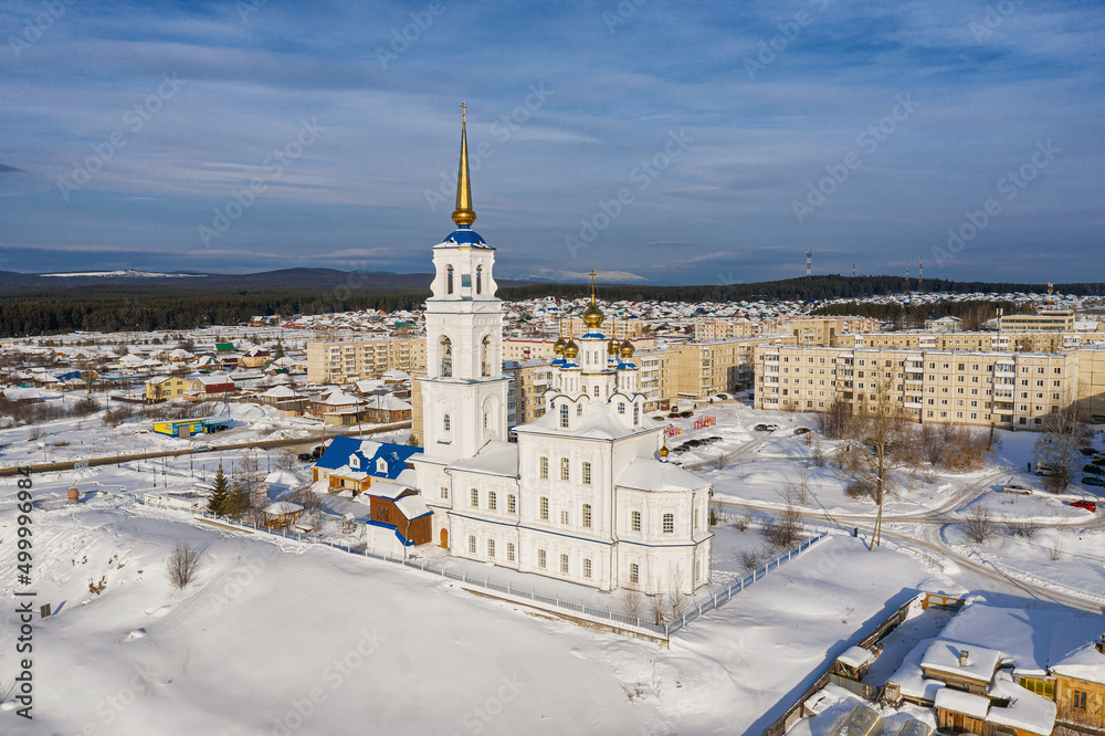 Obraz premium Severouralsk city in winter. The Church of Peter and Paul. Aerial view.