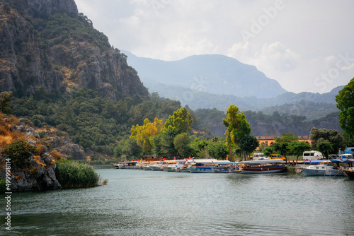 Tourist boats moored by the side of the Dalyan River
