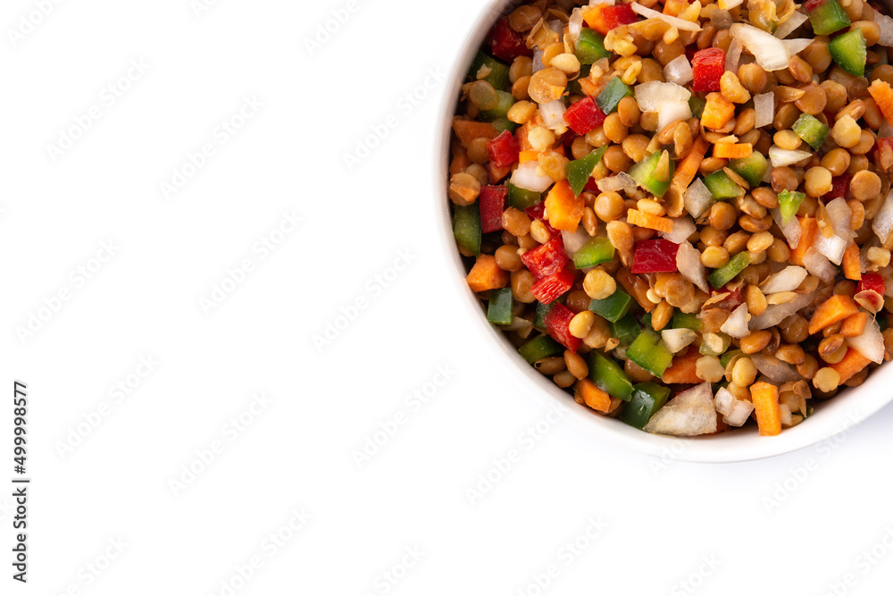 Lentil salad with peppers,onion and carrot in a bowl isolated on white background. Top view. Copy space Lentil salad with peppers,onion and carrot in a bowl isolated on white background. Top view. Copy space