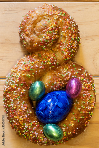 Tradicional mona de Pascua, con huevos de chocolate photo