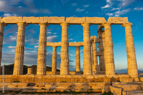 The Temple of Poseidon at Cape Sounion at sunset  over the Aegean Sea  Greece