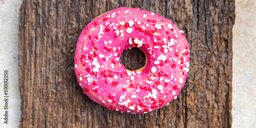 donut pink sweet dessert meal food snack on the table copy space food background
