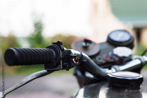 close up of retro bike, vintage motorcycle, handle drive bar