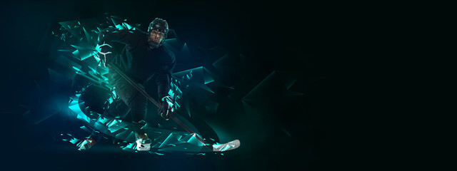 Young man, professional hockey player in protective uniform training isolated on dark background polygonal, fluid neon elements. Concept of sport