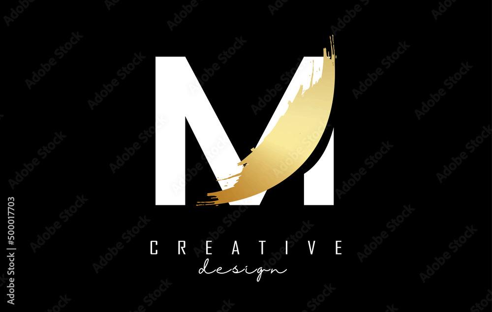 White Letter M logo with golden brush stroke and creative cut on a ...
