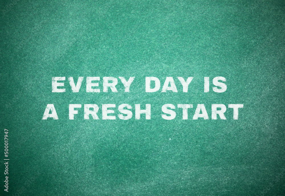 Every Day Is A Fresh Start. Motivational quote inspiring to seize all opportunities. Text on green chalkboard Every Day Is A Fresh Start. Motivational quote inspiring to seize all opportunities. Text on green chalkboard