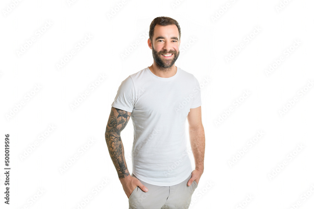 Fototapeta premium portrait of casual young man with beard and tattoo on white background