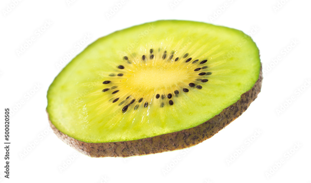 One falling kiwifruit slice isolated on the white background. One falling kiwifruit slice isolated on the white background.