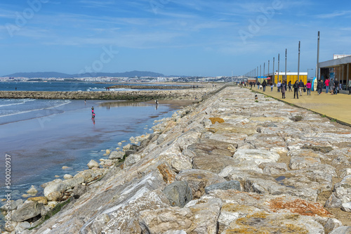 Beachfront and beach, Costa da Caparica, Setubal Province, Portugal photo