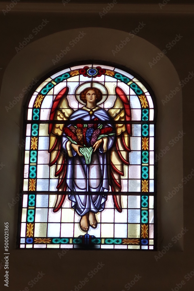 Candelaria, Tenerife, Canary Islands, Spain, March 8, 2022: Stained-glass window with an angel in the Basilica of Candelaria in Tenerife. Spain