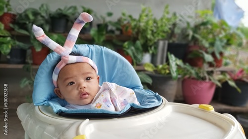Asian happy baby smiling with copy space. Cute 4 months baby.