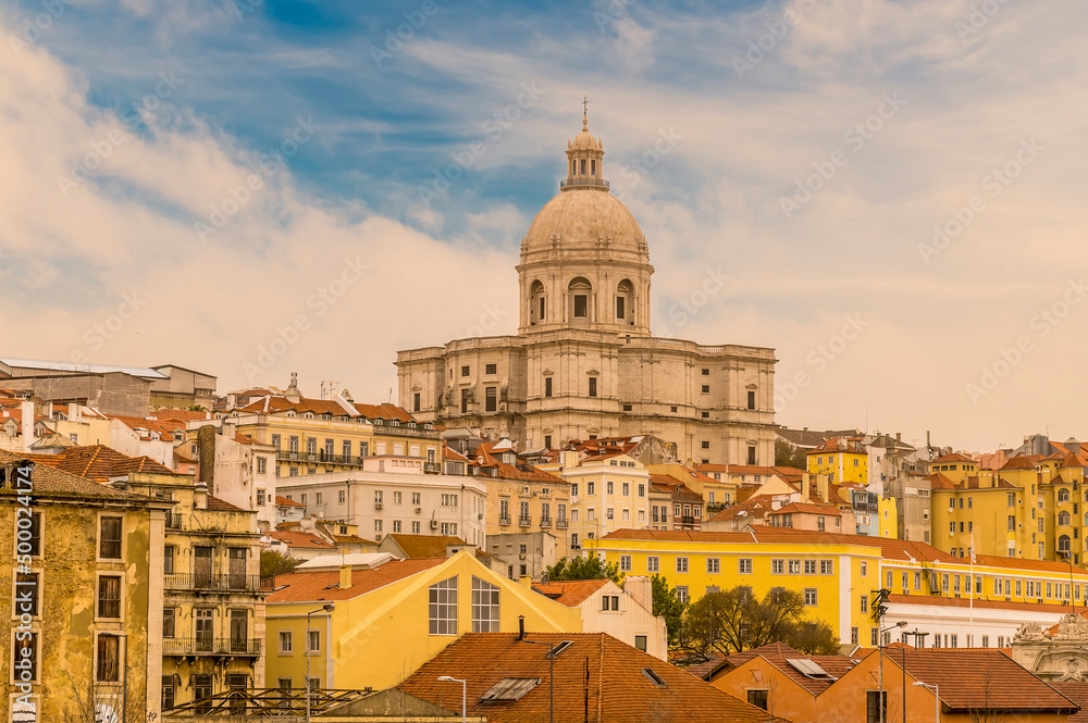 A view towards the top of the Alfama distict from the cruise terminal in the city of Lisbon on a spring day