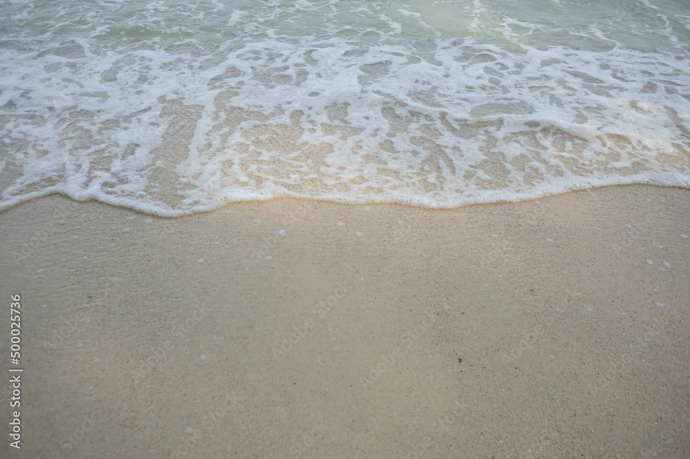 Sea waves crashing on the beautiful sandy beach. Sea waves crashing on the beautiful sandy beach.