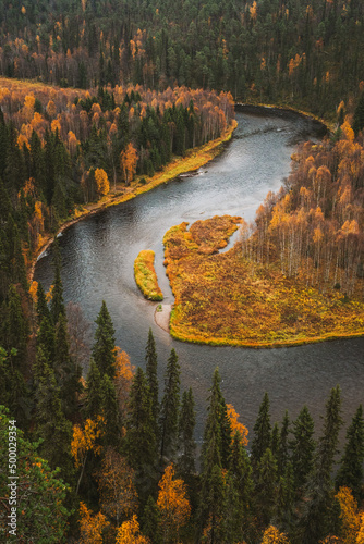 Autumn river flowing photo