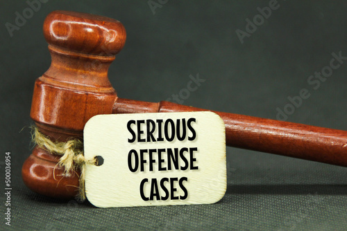 Canvas Print wooden hammers and wooden tags with the words serious offense cases