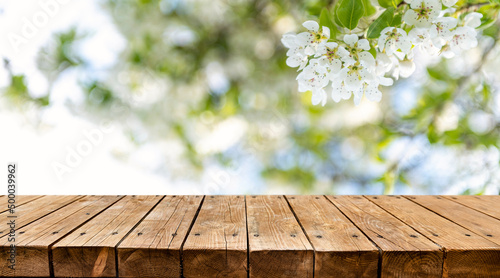 Wallpaper Mural Empty wooden table with spring theme in the background Torontodigital.ca