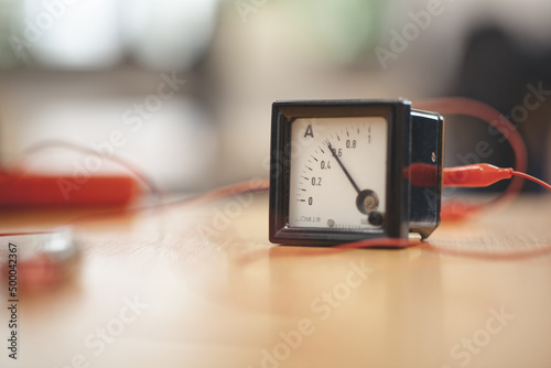 Selective of an ammeter on a table photo