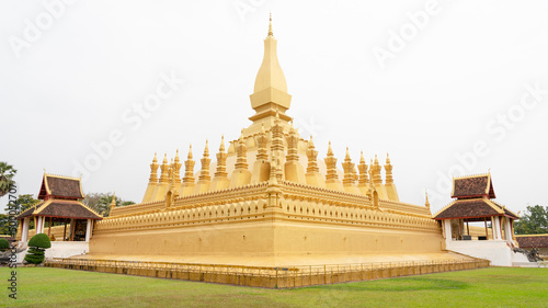 Scenic view of Pha That Luang Buddhist stupa in the center of the city of Vientiane, Laos photo