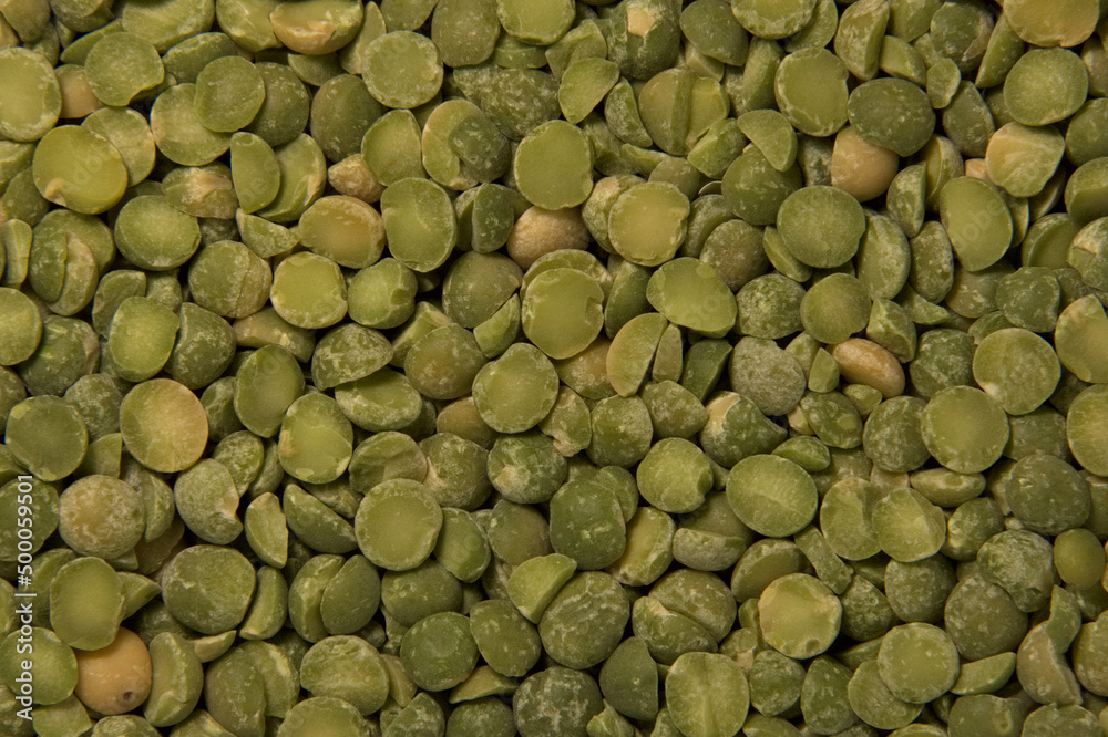 Background of green pea groats. Close up. Background of green pea groats. Close up.