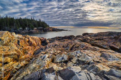 Breathtaking view of the rocky Maine coastline in Acadia National Park, Maine in a cloudy morning