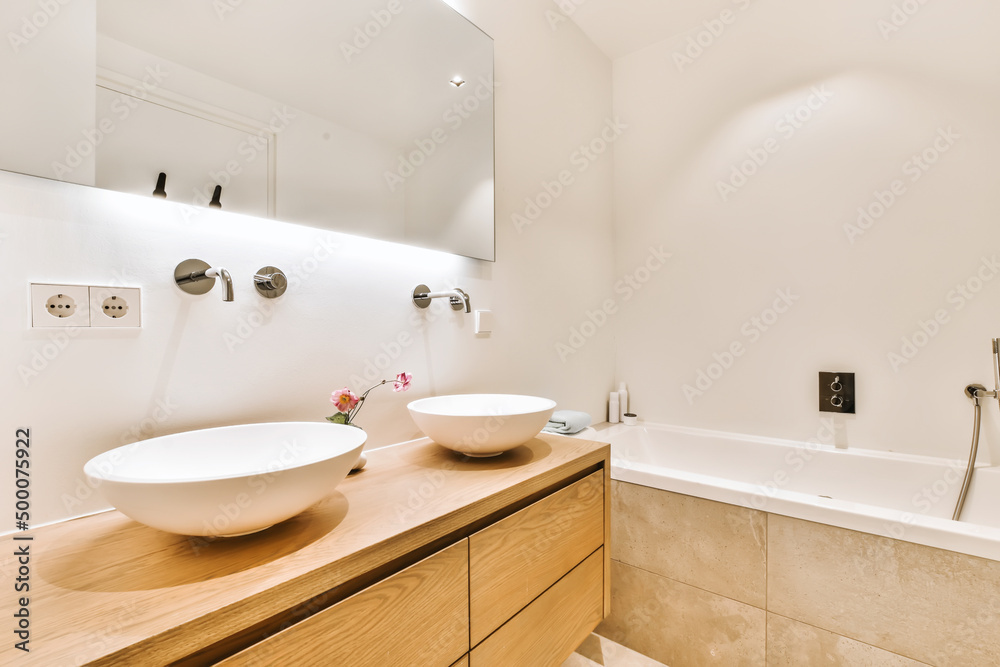 Bathroom with sinks and shower cabin Bathroom with sinks and shower cabin