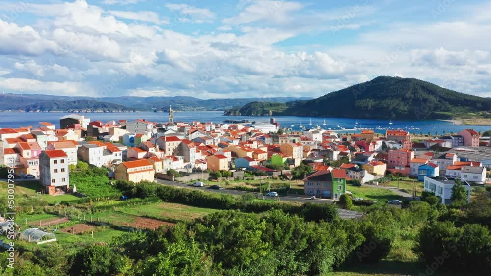 Scenic aerial view of coastal housing village in idyllic natural environment at sunny day Scenic aerial view of coastal housing village in idyllic natural environment at sunny day