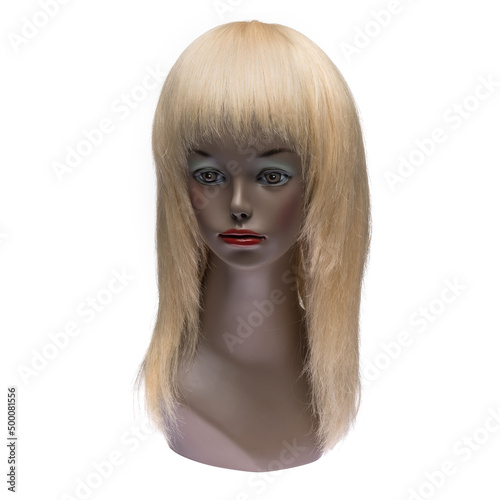 Natural hair wig on a mannequin on a white isolated background. Blonde, long straight hair. Front view