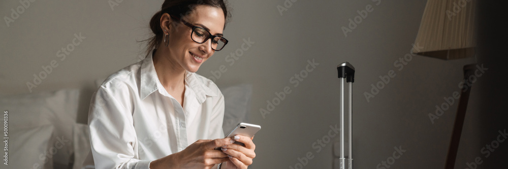 Smiling mid aged brunette white businesswoman Smiling mid aged brunette white businesswoman