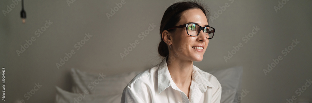 Smiling mid aged brunette white businesswoman Smiling mid aged brunette white businesswoman