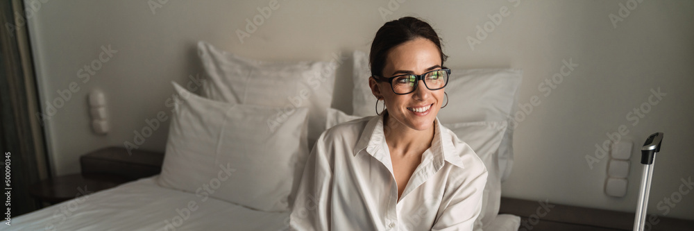 Smiling mid aged brunette white businesswoman Smiling mid aged brunette white businesswoman