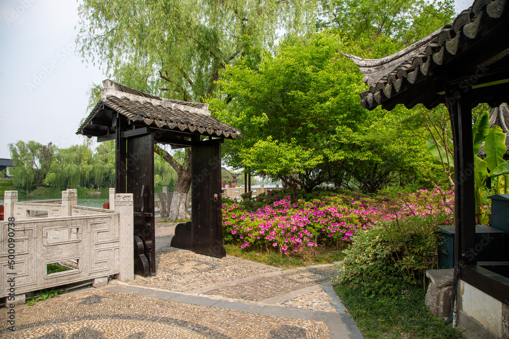 A wooden gate of the courtyard.